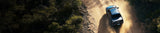 Pickup truck driving on a dirt road